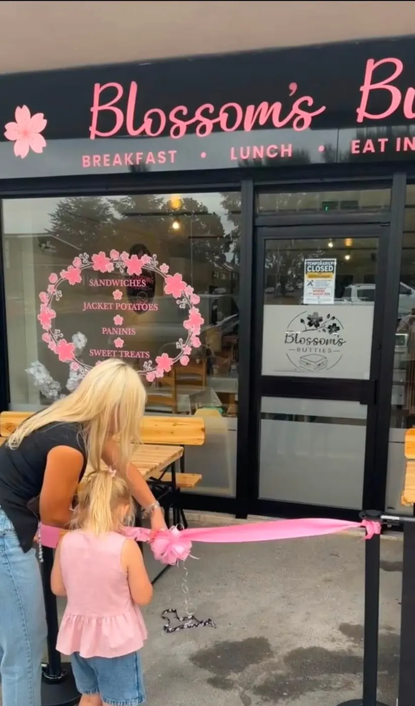 Ribbon cutting outside the Blossoms Butties storefront