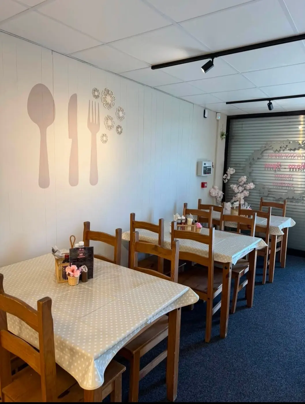 Tables and seating inside Blossoms Butties